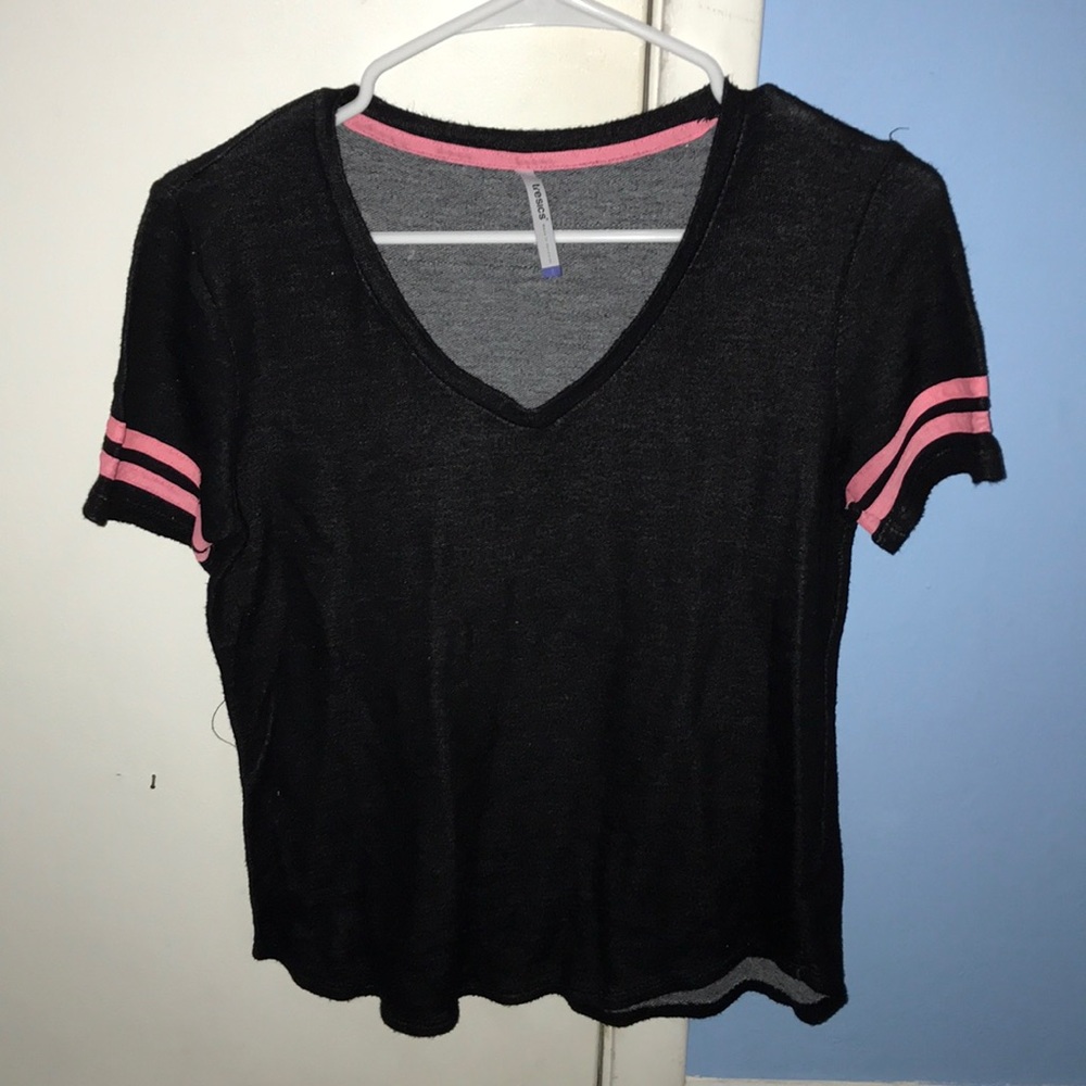 loose black v neck + pink stripes on the sleeves